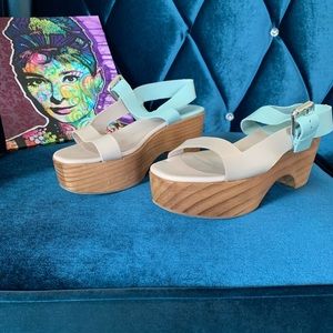 Square toe platform block sandals.